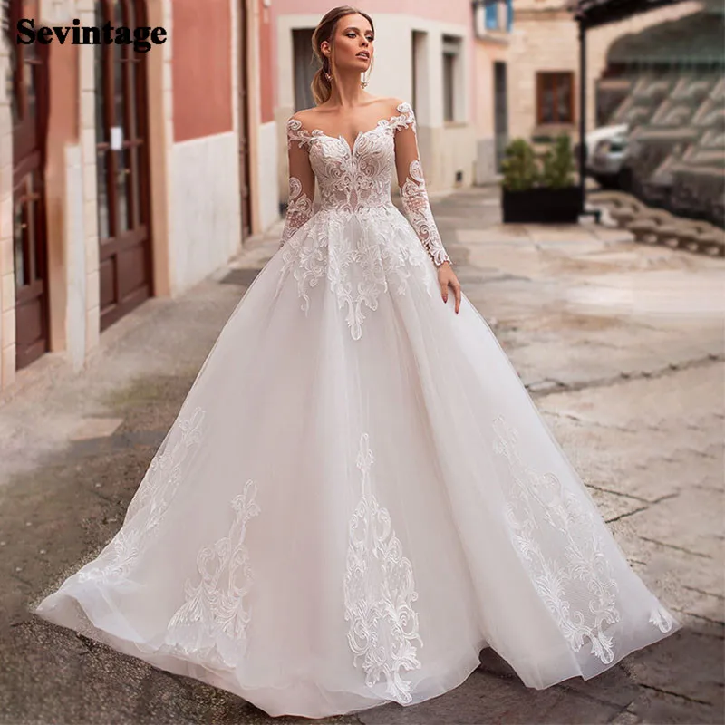

A-Line Long Sleeves Boho Wedding Dress Romantic Appliques Lace Bridal Dresses Nude Tulle Back Princess Wedding Party Gowns 2021