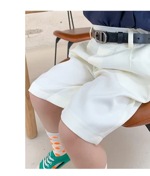 

BELTED BERMUDA SHORTS -Flowing high-waist Bermuda shorts. Contrast belt appliqué with metal buckle.
