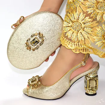 

Fashion gold Shoes and bag set high heels with crystal designs Italian traditional wedding party sandals matching a nice bag