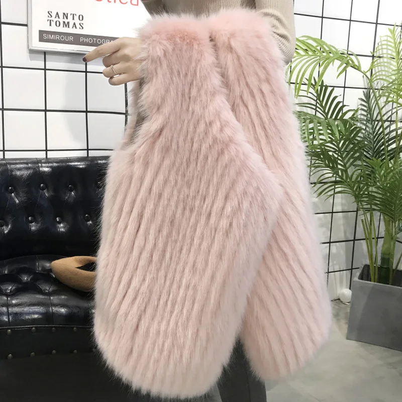 

2019 new autumn winter new loose fox fur vest compiled imitation fur vest female long section fur one plush coat