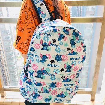 

Size: 13*32*42cm Blue Stitch Cartoon Canvas Backpack Travel Plush Kitty Bag