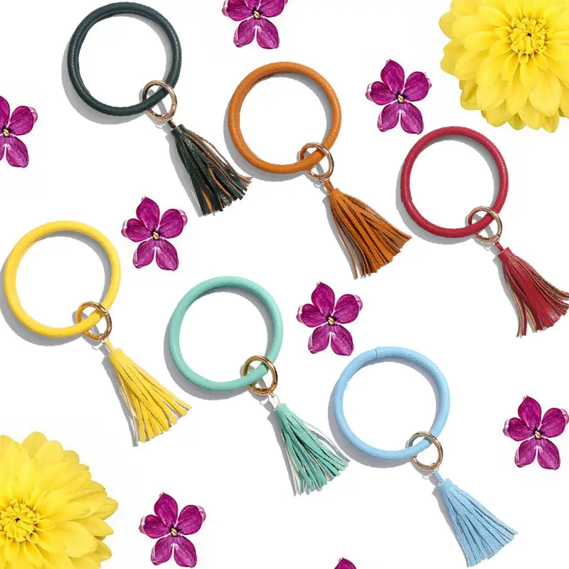 

JUST FEEL 19 Colors Pu Leather Tassel Keychain Round For Women Multiful Fashion Key Chains Wrist Strap Accessories Wholesale