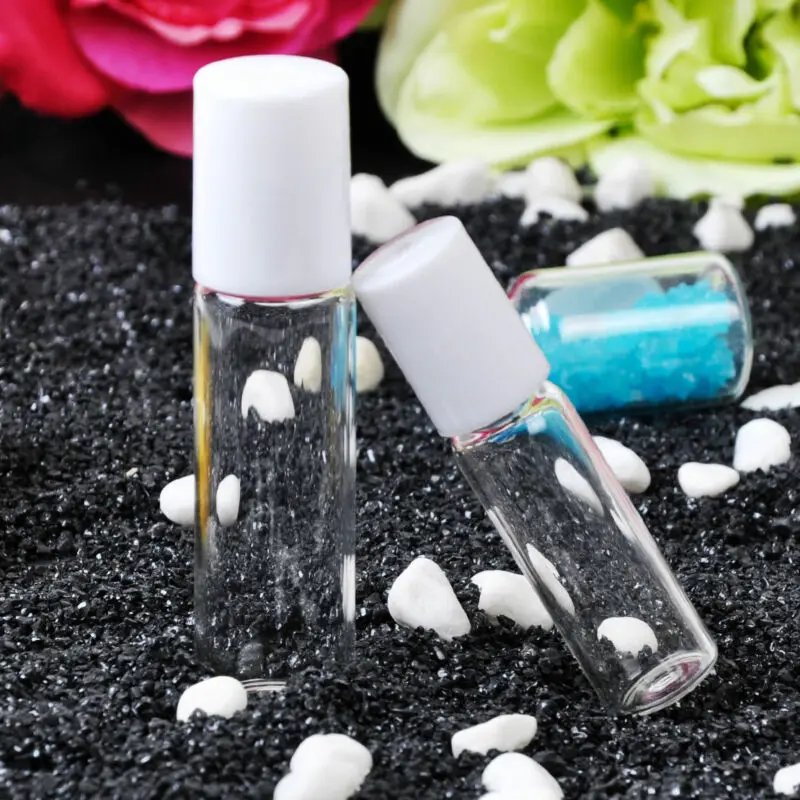 

Transparent glass roll-on bottle with white plastic cover and portable essential oil cosmetic sub-bottle 5/10ml empty bottle