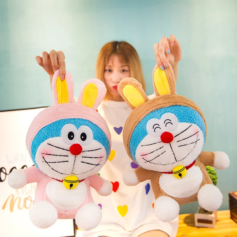 

Turning Jingle Cats Plush Toys Turning Tiger Rabbit Doraemon Doll