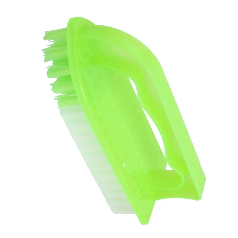 Зеленые щипцы с желтой пластиковой ручкой для чистки одежды и обуви