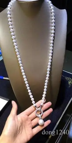 

Beautiful South Sea round white 9-10mm pearl necklace 24 inch pendant