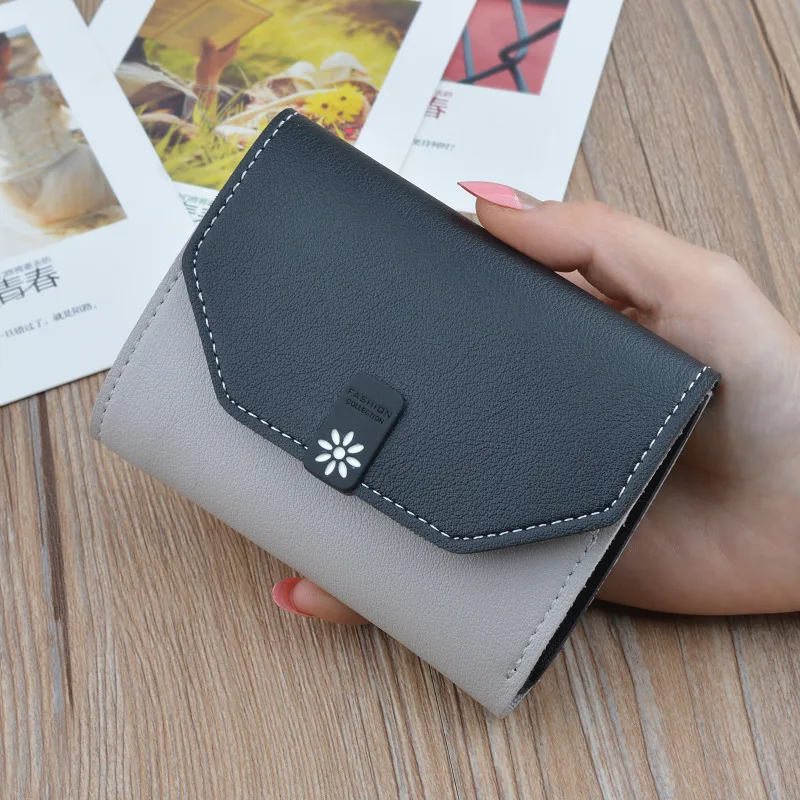 

Autumn and winter new women's small wallet Korean version personalized color contrast envelope three fold short school girl