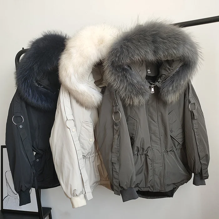 Большой натуральный мех енота женская зимняя куртка с капюшоном теплая Женская куртка-пуховик средней длины парка свободное Женское пальто