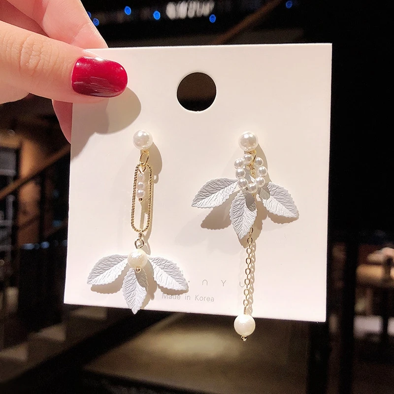 

925 silver needle fashionable Korean wind pale white flower earrings simple temperament earrings drop only beautiful earrings