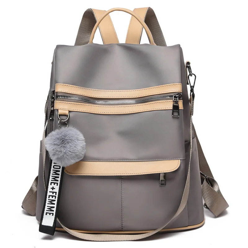 2021 New Backpacks for women Waterproof Anti-theft Oxford Cloth School Bags Simple College Wind Bags Hair Ball Pendant GE11 