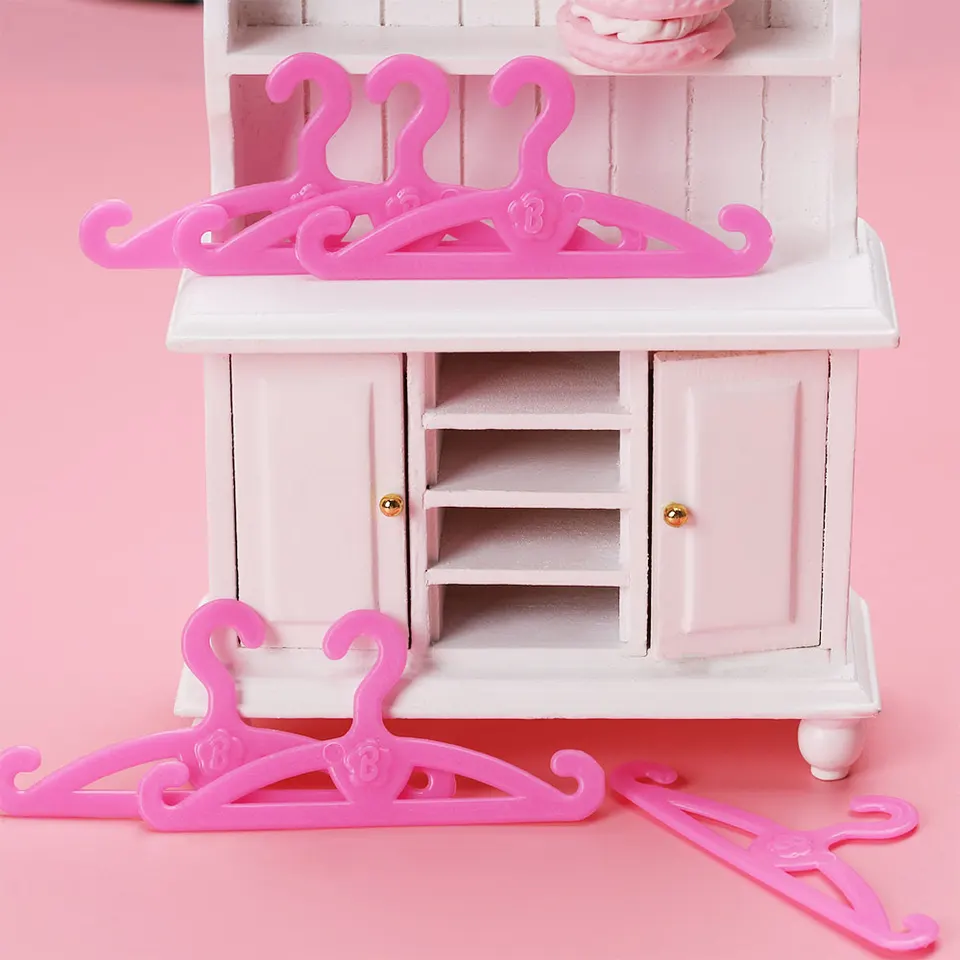 pink plastic dollhouse