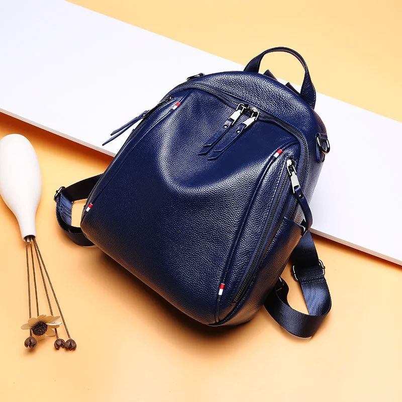 

Summer new shoulder bag lady English wind head leather double zipper large capacity baggage soft leather