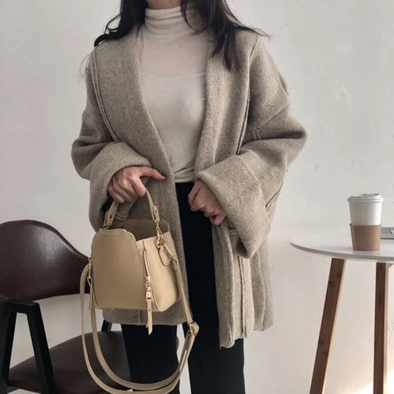 

Long-sleeved Solid Color Thick Loose Loose Size Sweater Coat Female Wild Cardigans Knits Autumn Winter New Sweaters