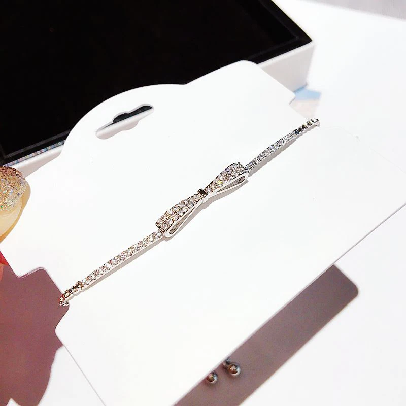Высококачественное микро украшенное кубическими камнями Циркон бант Регулируемая цепочка для браслета с кристальными подвесками для женщин