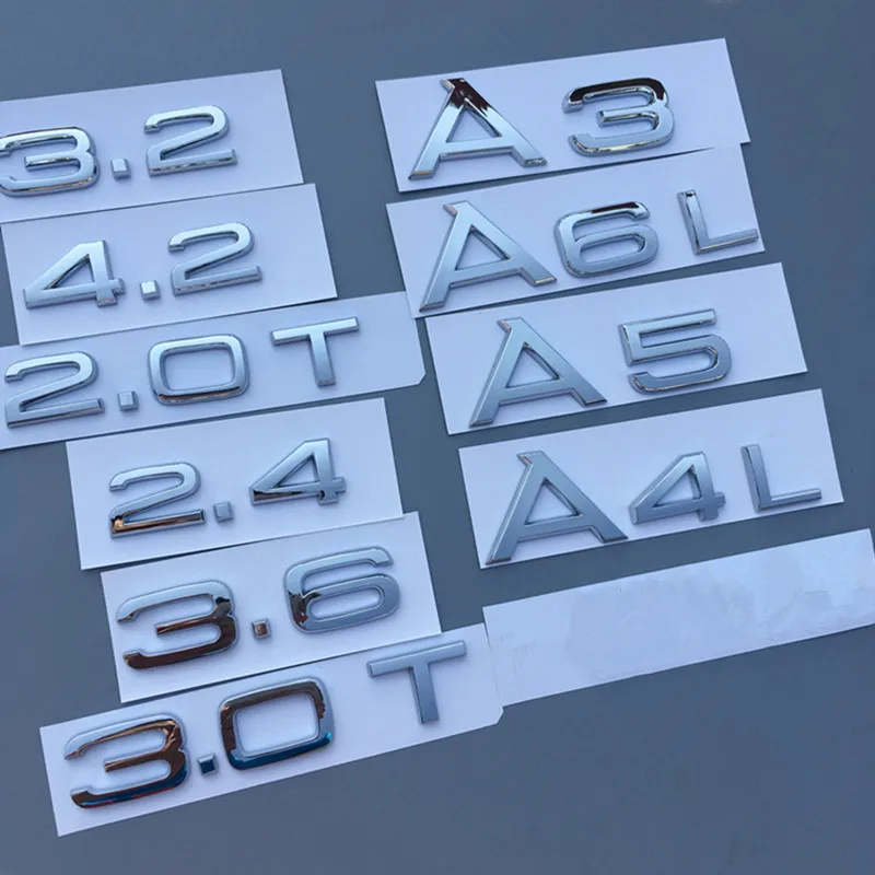 

A1 A3 A4 A5 A6 A7 A8 A4L A6L A8L Q3 Q5 Q7 1.8T 2.0T 2.4 2.8 3.0 3.0T 3.2 3.2T 4.2 emblem car rear sticker for Audi Letter Badge