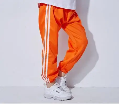 Детская одежда в стиле хип-хоп повседневные свободные штаны костюмы для джазовых танцев для девочек и мальчиков Вечерние брюки для танцев уличная одежда этап танцевальной одежды - Цвет: orange