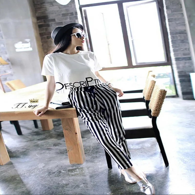 

Spring and autumn new women's wear Japanese and Korean girls style fashion short T-shirt + striped Harlan pants leisure suit. Lo
