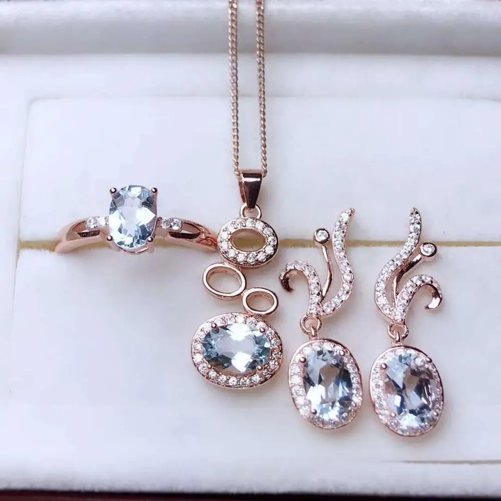 

Комплект из кольца и сережек с аквамарином, из серебра 925 пробы