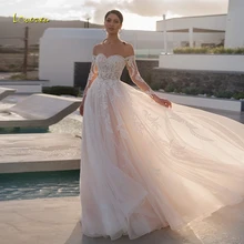 Loverxu abiti da sposa Vintage Boho 2021 Illusion senza spalline manica lunga abito da sposa Applique in pizzo A-line Beach Vestido De Novia