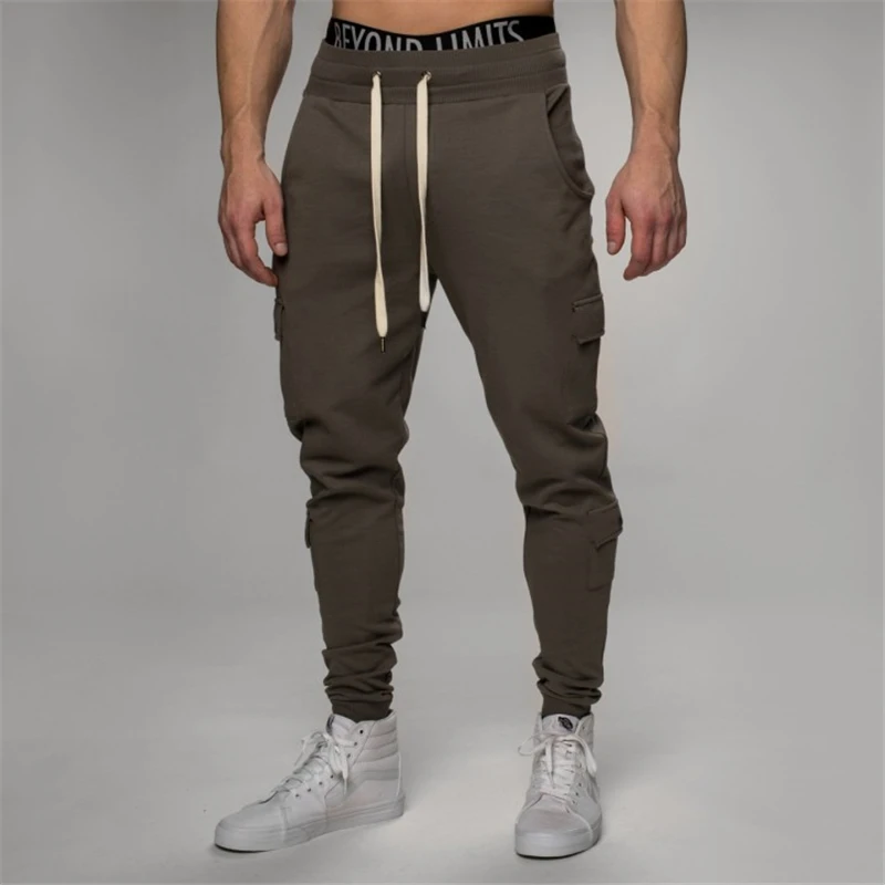 

Man Gyms Workout Fitness Brand Trousers Male Casual Skinny Track Pants Multiple pock Pants Mens best-selling Jogger Sweatpants
