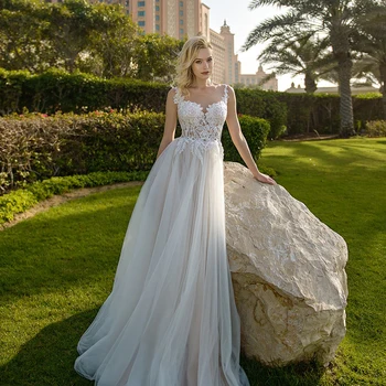 

Charming Sheer Neck A Line Wedding Dress Long With Tulle Train For Bride Lace Appliques Back Button Wedding Dresses Custom Made