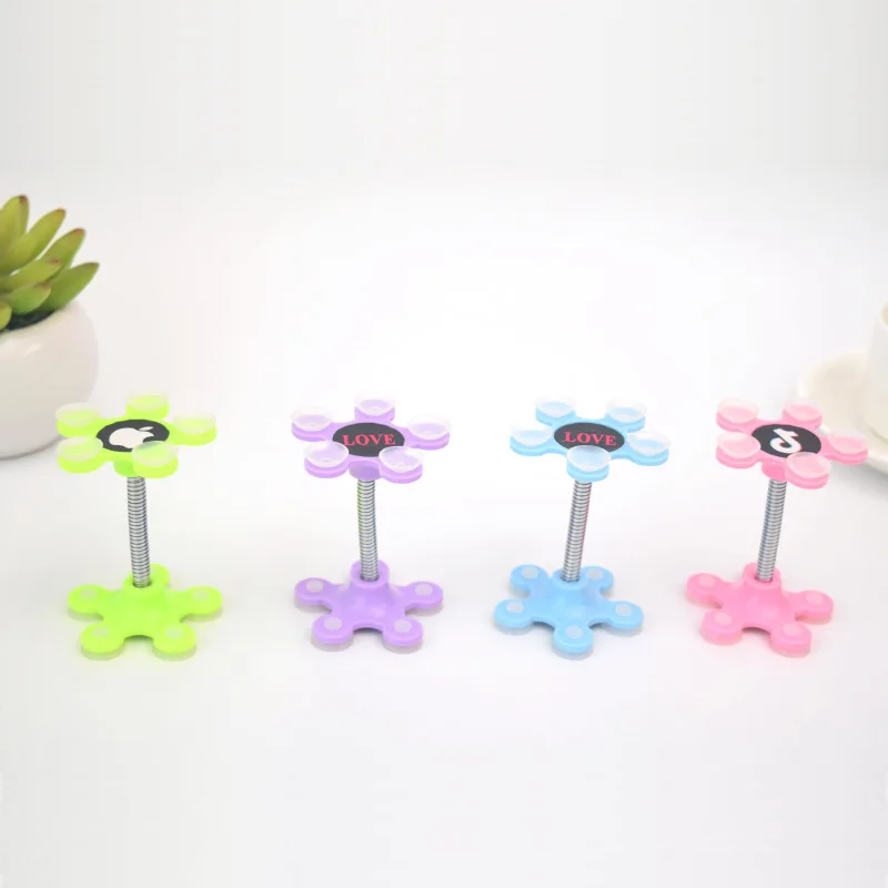 

Creative Magic Suction Type Phone Bracket Douyin Useful Product Double-Sided Silica Gel On-board Phone Holder Factory Direct Sel