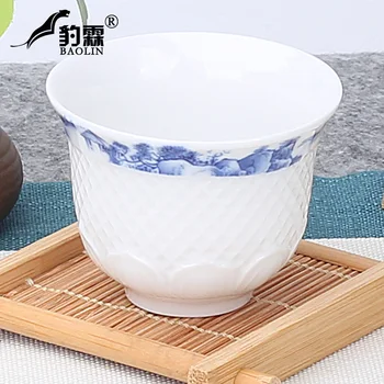 

cups of tea light bowl with a single sample tea cup masters cup tea jingdezhen blue and white porcelain is pure manual