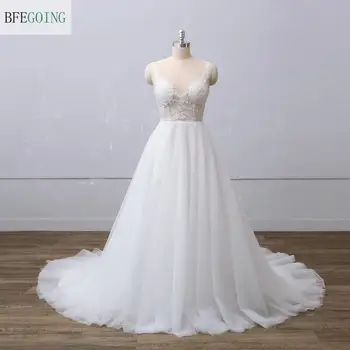 

White Tulle V-Neck Sleeveless Bridal gown Floor-Length A-line Wedding dress Chapel Train Custom made