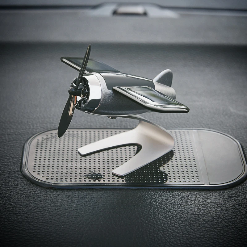 

Car styling airplane decoration Non-slip mat alloy Solar energy Rotate aircraft dashboard solid car decoration Perfume smell