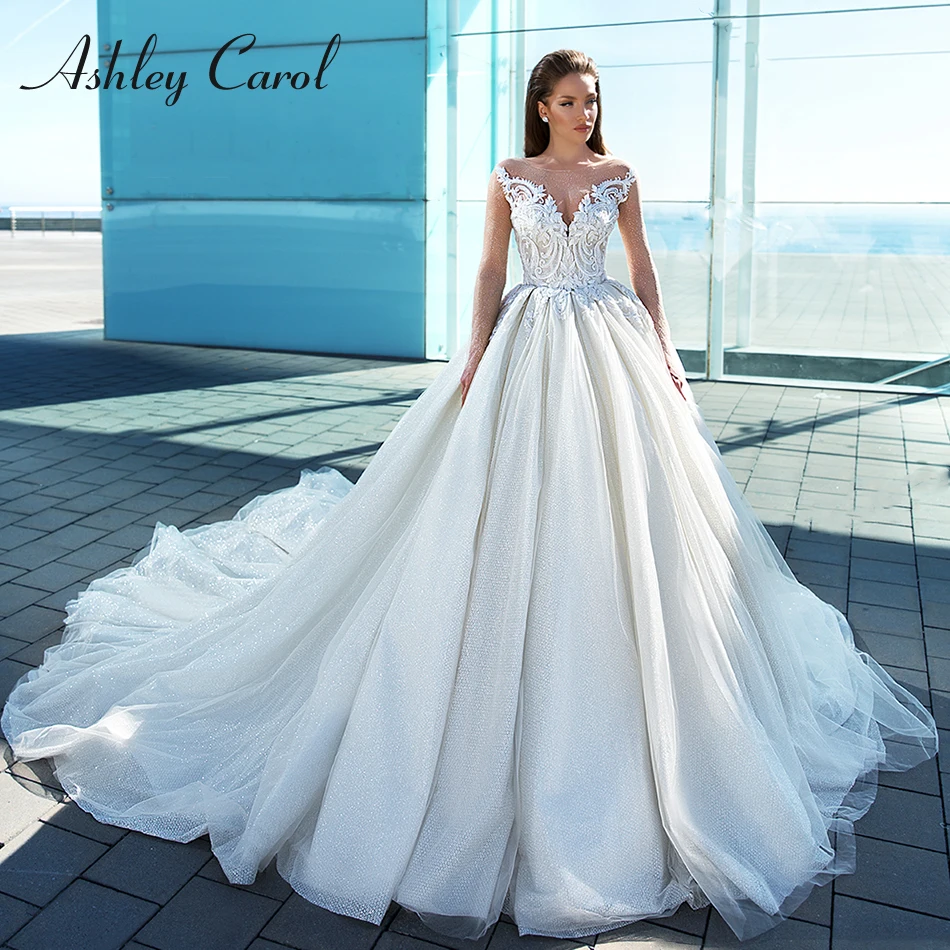

Ashley Carol Illusion Long Sleeves Wedding Dress 2020 Beaded Appliques Shining Chapel Train Bridal Dress Vintage Wedding Gowns