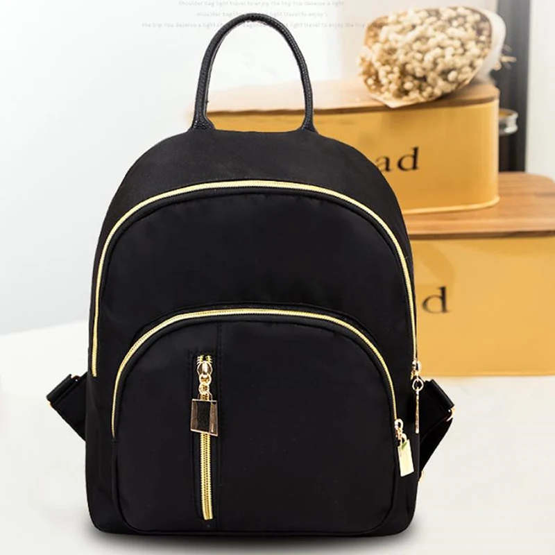 Bolso de moda novedosa para mujer, bandolera de uniforme negro, oferta especial, mochila informal sencilla para estudiantes