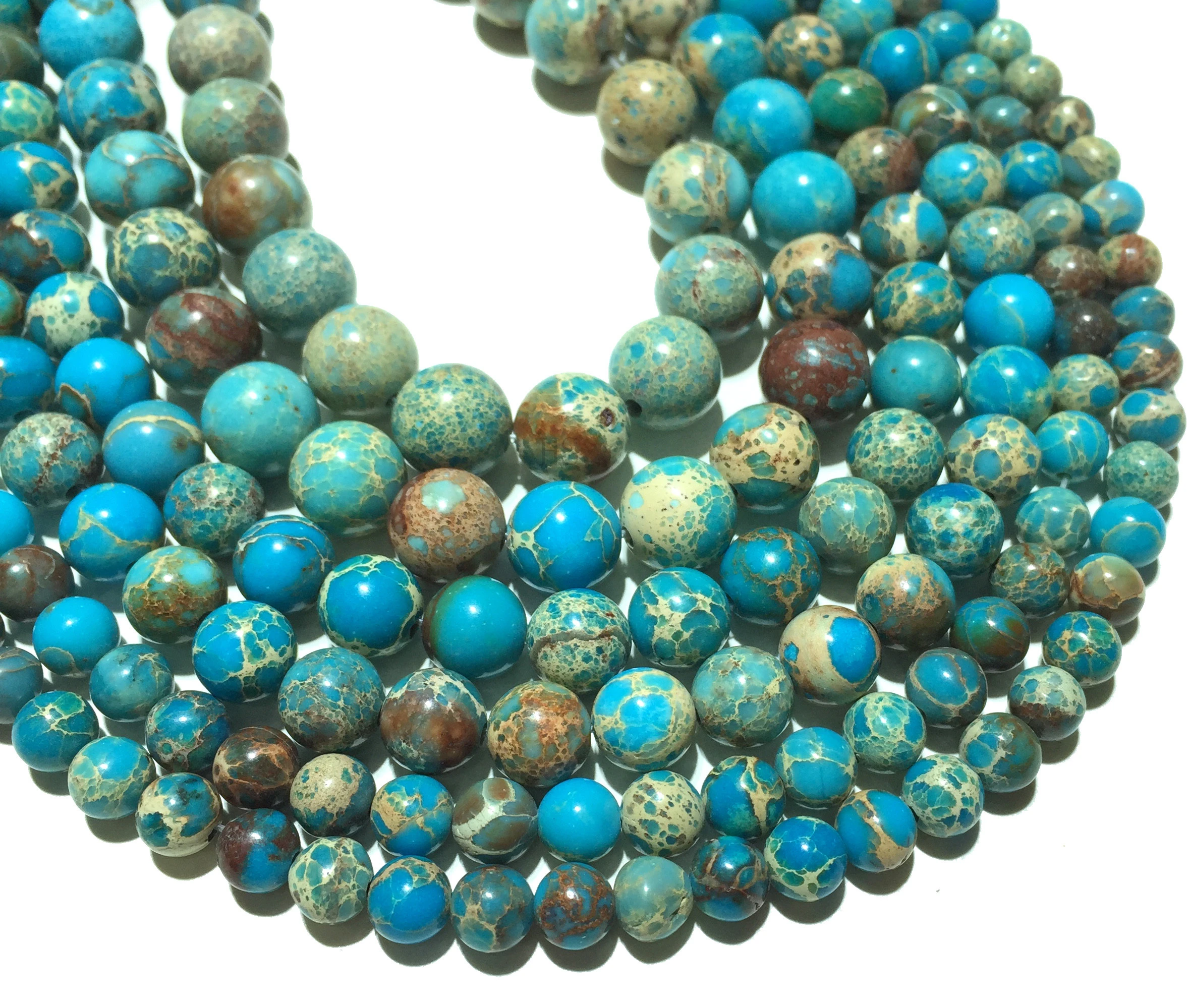 toggle. with 4mm blue resin round beads and silver-toned filigree space beads Imperial Infused Jasper 9-piece graduated lengths/' necklace