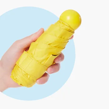 

Mini capsule pocket parasol girl UV proof waterproof portable umbrella fashion folding umbrella lady