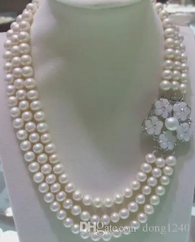 

Venta al por mayor de alta calidad natural 9-10mm blanco perla de agua dulce y bonita Flor de broche
