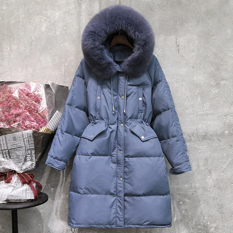 

Large Natural Fox Fur Collar Hooded Long Down Parka Warm 90% White Duck Down Parka Female Sash Tie Up Thick Snow Coats