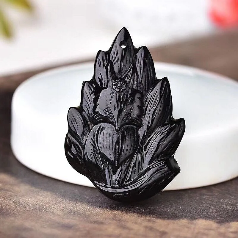 

Natural frosted obsidian drop nine-tailed fox pendant to attract wealth and protect against small men and women