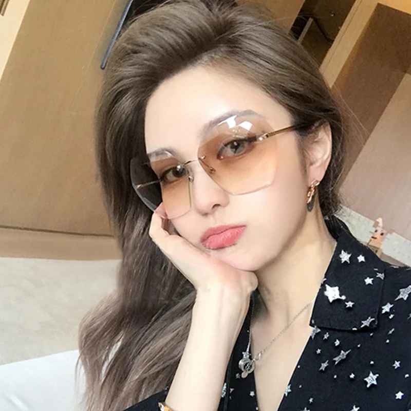 

New Style large frame cut edge sunglasses, ladies trend frameless marine film sunglasses
