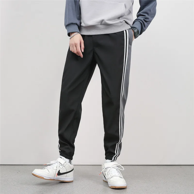 

Large Size K1059/P45 Autumn Clothing New Men Ankle Banded Pants Loose-Fit Sports Ninth Pants Casual Pants Men's Fashion Large
