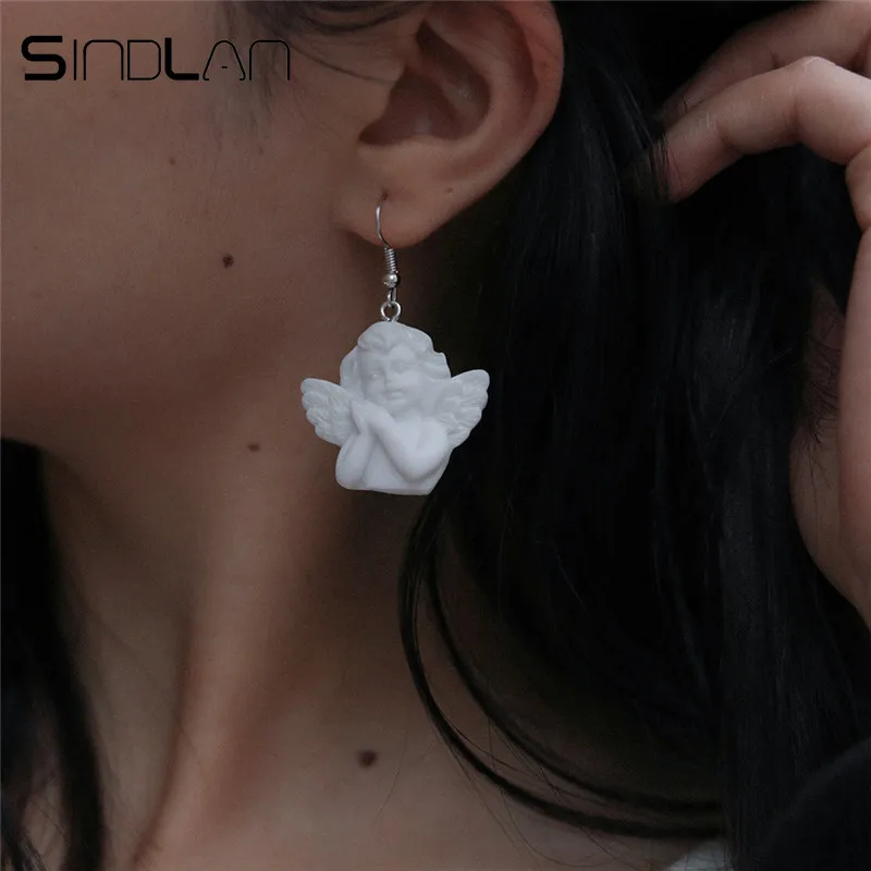 

Sindlan White God of Love Cupid Angel Dangle Earrings for Women Fashion Boho Statement Drop Earrings Girls Female Brinco Jewelry
