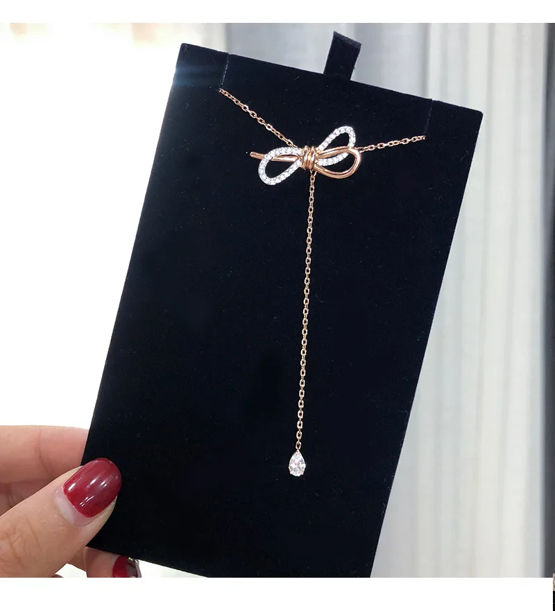 

Hot new style bow tassel necklace lady double color short style collar bone chain tide temperament web celebrity crystal choker
