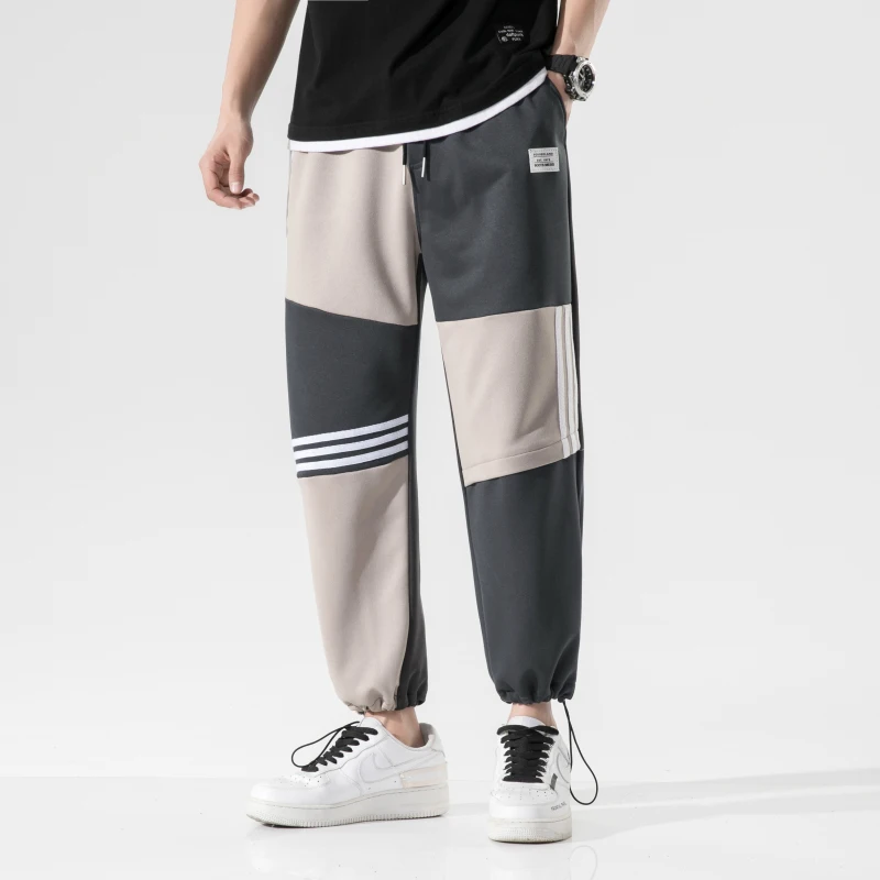 Pantalones informales holgados para hombre, pantalones bombachos holgados de cintura elástica, para primavera y verano, para trotar, novedad de 2021