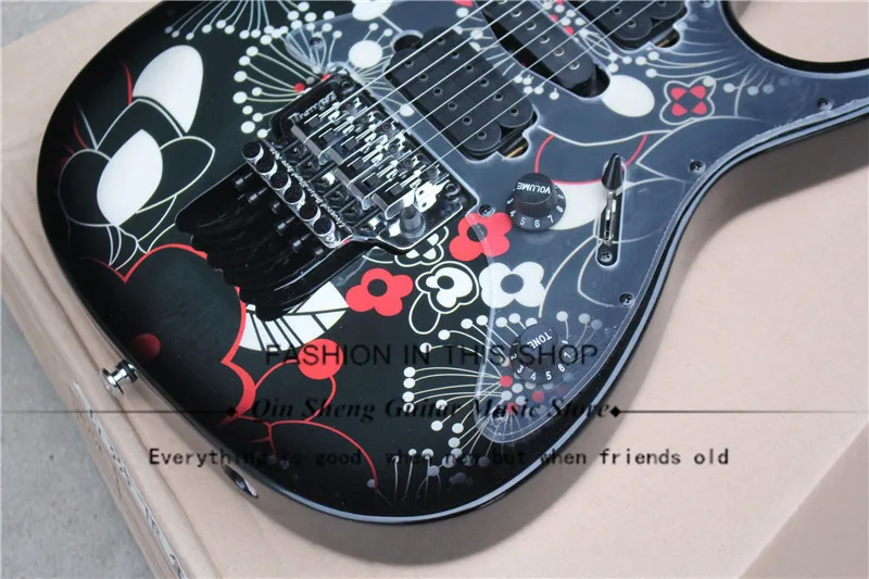 

free shipping black electric guitar with flower patten,tremolo bridge,SSH pickups,24 frets with shell inlay,black hardware