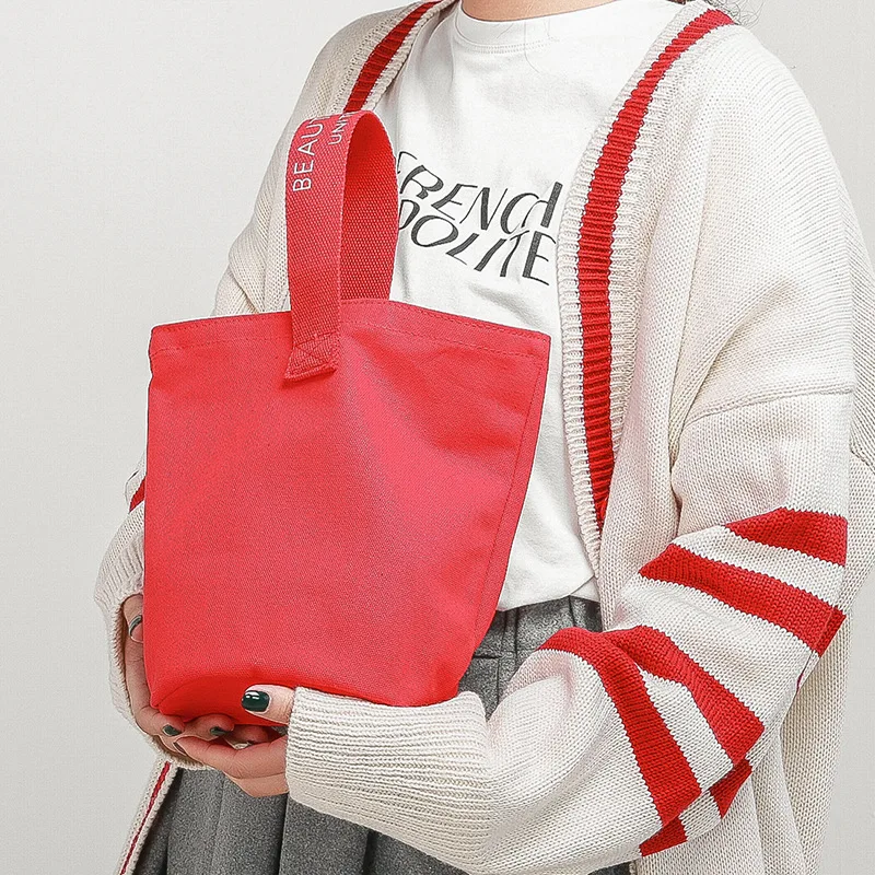 

Japan and South Korea simple and fresh letters student portable environmental protection small bag canvas bag bucket bag