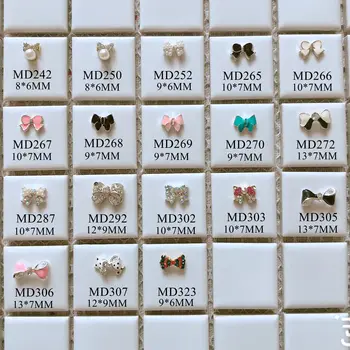 

50pcs/bag 3D Charms Metal Bowtie Bow Rhinestone and Pearl Bow Deco Nail Decoration Metal Nail Art Deco