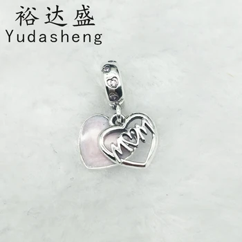

The peach heart on the front is decorated with a carved "Mom" letter. Engraved on the back of the pendant is "I love you"