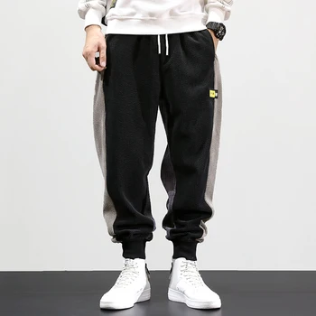 

Autumn Winter Fashion Men Jeans Loose Fit Spliced Designer Corduroy Harem Pants Slack Bottom Elastic Waist Hip Hop Joggers Pants
