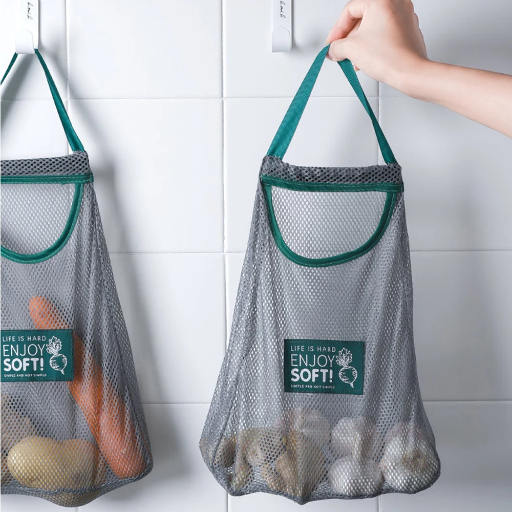 Fruit, vegetable, scallion and ginger in kitchen bag Simple reusable mesh kitchen storage bag Kitchen Storage Bag