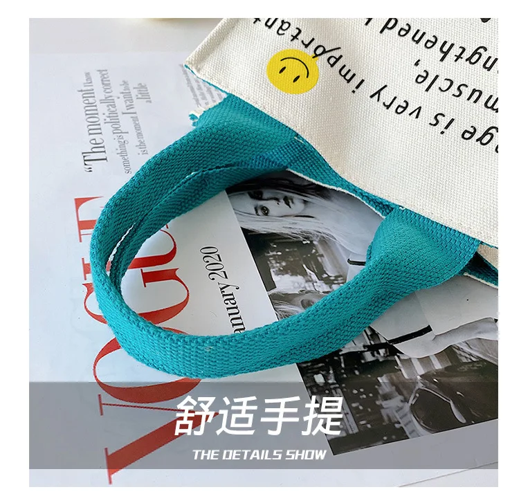 2022 Canvas bag New Summer Korean Japanese Cartoon Canvas Smile Handbag Large Capacity Shoulder Bag Hit Color Letter Female Tote