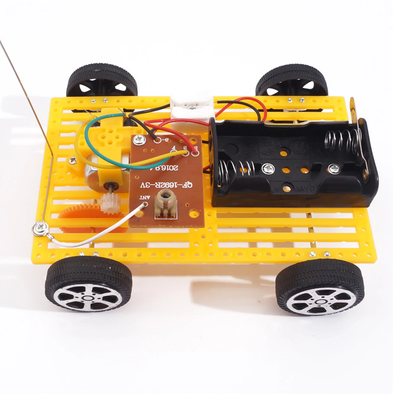 Vue éclatée du Kit de Voiture de Course RC 2CH avec moteur, télécommande et pièces de carrosserie