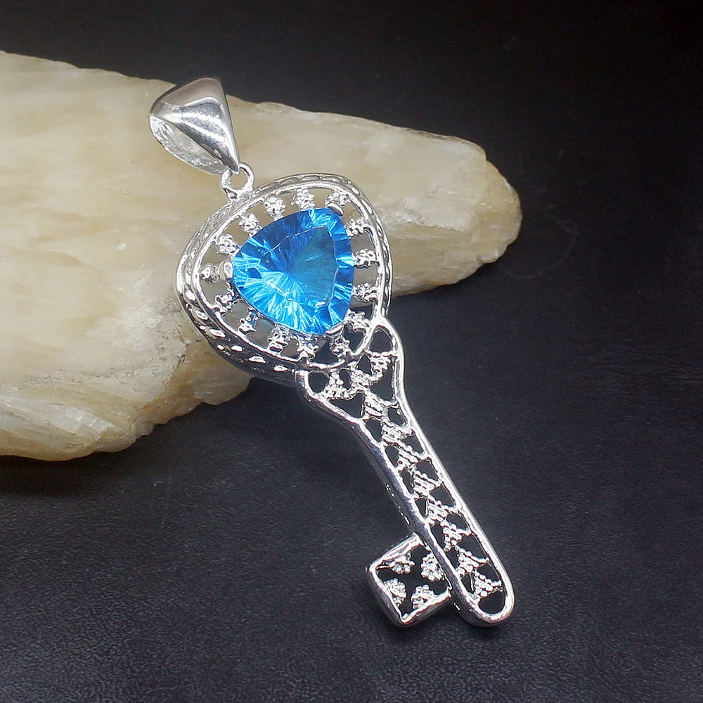 

Женский кулон с голубым топазом, из серебра 925 пробы
